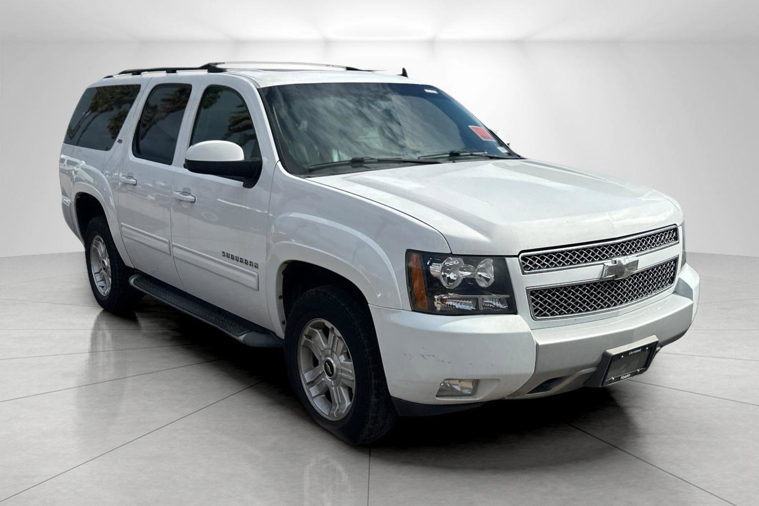 2012 Silver Ice Metallic Chevrolet Suburban Z71 4x4 #58090050 Photo #8 |  GTCarLot.com - Car Color Galleries, image size:1566x1044