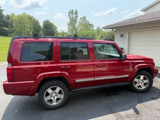Used 2010 Jeep Commander Sport w/ Sun/Sound Group image 1