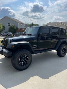Used 2011 Jeep Wrangler Unlimited Sport