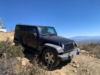 Used 2013 Jeep Wrangler Unlimited Sport