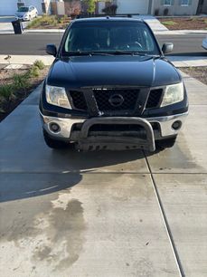 Used 2011 Nissan Frontier SV w/ SV Premium Utility Pkg
