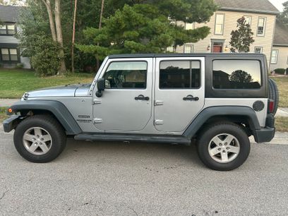 Used 2014 Jeep Wrangler Unlimited Sport w/ Dual Top Group