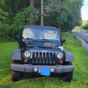 Used 2010 Jeep Wrangler Unlimited Sport
