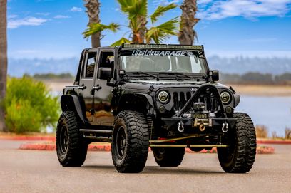 Used 2014 Jeep Wrangler Unlimited Sport