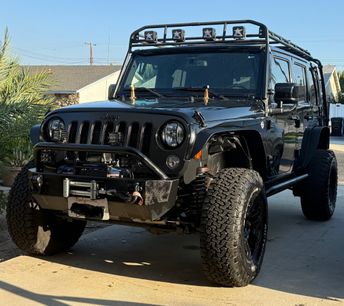 Used 2014 Jeep Wrangler Unlimited Sahara