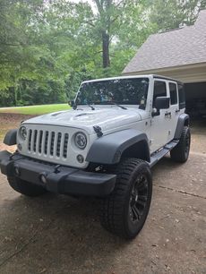 Used 2014 Jeep Wrangler Unlimited Sport w/ Dual Top Group