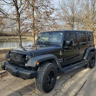 Used 2015 Jeep Wrangler Unlimited Sport