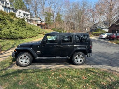Used 2012 Jeep Wrangler Unlimited Sahara w/ Dual Top Group
