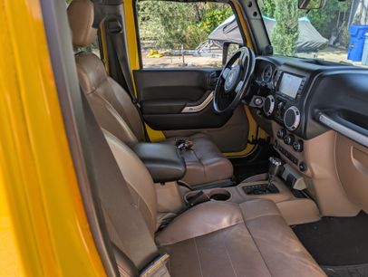 Used 2011 Jeep Wrangler Unlimited Rubicon w/ Dual Top Group