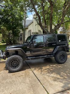 Used 2013 Jeep Wrangler Unlimited Sport