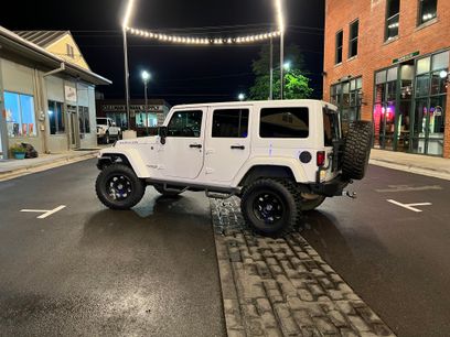 Used 2014 Jeep Wrangler Unlimited Rubicon w/ Dual Top Group