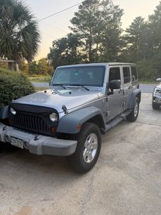 Used 2013 Jeep Wrangler Unlimited Sport