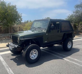 Used 2006 Jeep Wrangler Unlimited w/ Premium Audio Group