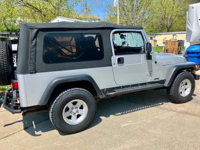 Used 2006 Jeep Wrangler Unlimited w/ Premium Audio Group