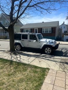 Used 2013 Jeep Wrangler Unlimited Sahara w/ Dual Top Group