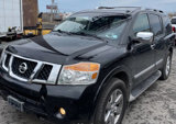 Used 2011 Nissan Armada Platinum w/ 2nd Row Captain Seat Pkg image 2