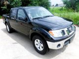 Used 2010 Nissan Frontier SE image 2