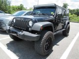 Used 2014 Jeep Wrangler Unlimited Sport image 2