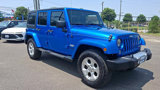 Used 2015 Jeep Wrangler Unlimited Sahara w/ Dual Top Group image 2