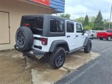 Used 2016 Jeep Wrangler Unlimited Sport w/ Mopar Black Appearance Group image 4