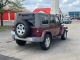 Used 2010 Jeep Wrangler Unlimited Sahara w/ Dual Top Group image 4