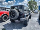 Used 2017 Jeep Wrangler Unlimited Sport w/ Mopar Black Appearance Group image 2