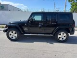 Used 2010 Jeep Wrangler Unlimited Sahara w/ Dual Top Group image 2