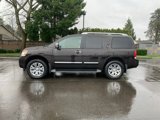 Used 2015 Nissan Armada Platinum w/ 2nd Row Captain Seat Package image 2
