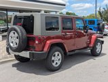 Used 2010 Jeep Wrangler Unlimited Sahara w/ Dual Top Group image 4