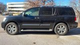 Used 2010 Nissan Armada Platinum w/ Captain Seat Pkg image 2