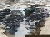 Used 2024 Volkswagen Tiguan SE w/ Panoramic Sunroof Package image 2