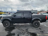 Used 2010 Nissan Frontier SE image 2
