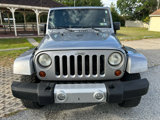 Used 2013 Jeep Wrangler Unlimited Sahara w/ Dual Top Group image 2