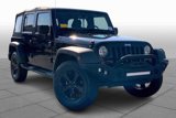 Used 2013 Jeep Wrangler Unlimited Sport image 2