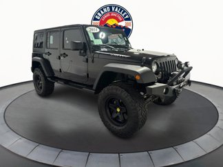 Used 2014 Jeep Wrangler Unlimited Sport image 1