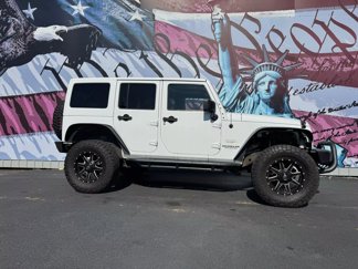 Used 2014 Jeep Wrangler Unlimited Sahara w/ Connectivity Group image 1