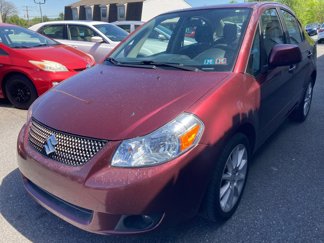 Used 2011 Suzuki SX4 LE image 1
