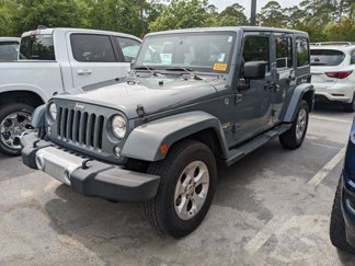 Used 2014 Jeep Wrangler Unlimited Sahara w/ Max Tow Package image 1