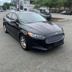 Used 2015 Ford Fusion SE image 1
