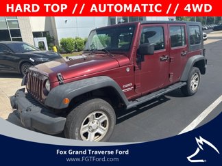 Used 2010 Jeep Wrangler Unlimited Sport w/ Black Appearance Group image 1