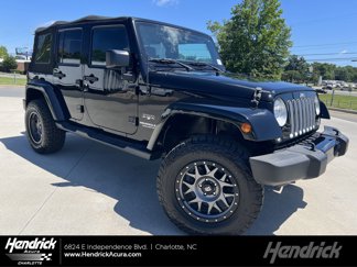 Used 2016 Jeep Wrangler Unlimited Sahara w/ Connectivity Group image 1