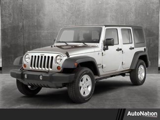 Used 2012 Jeep Wrangler Unlimited Sport image 1