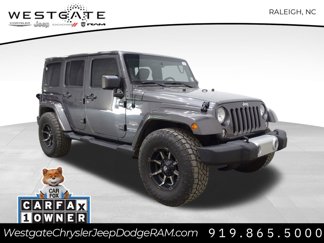 Used 2014 Jeep Wrangler Unlimited Sahara w/ Dual Top Group image 1
