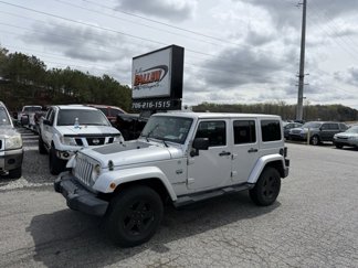 Used 2012 Jeep Wrangler Unlimited Sahara image 1