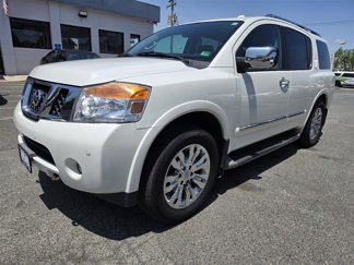 Used 2015 Nissan Armada Platinum w/ 2nd Row Captain Seat Package image 1