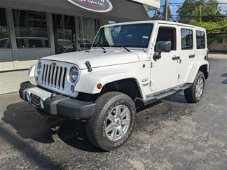 Used 2016 Jeep Wrangler Unlimited Sahara image 1