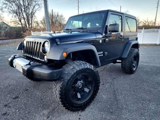 Used 2015 Jeep Wrangler Sport image 1