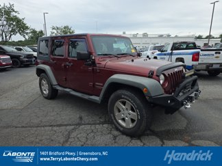 Used 2010 Jeep Wrangler Unlimited Sport image 1