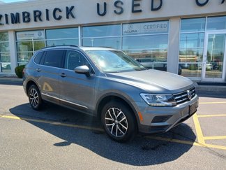 Used 2021 Volkswagen Tiguan SE w/ Panoramic Sunroof Package image 1