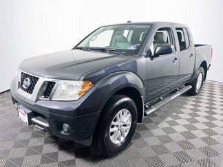 Used 2015 Nissan Frontier SV image 1